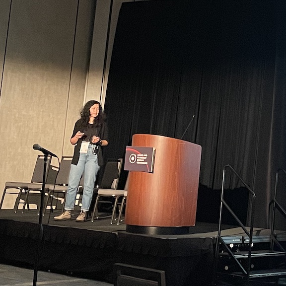 Kris Izquierdo giving a talk at LPSC 2022