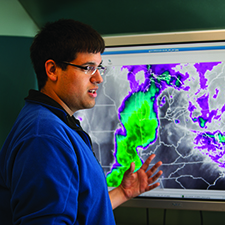 Student studying a map